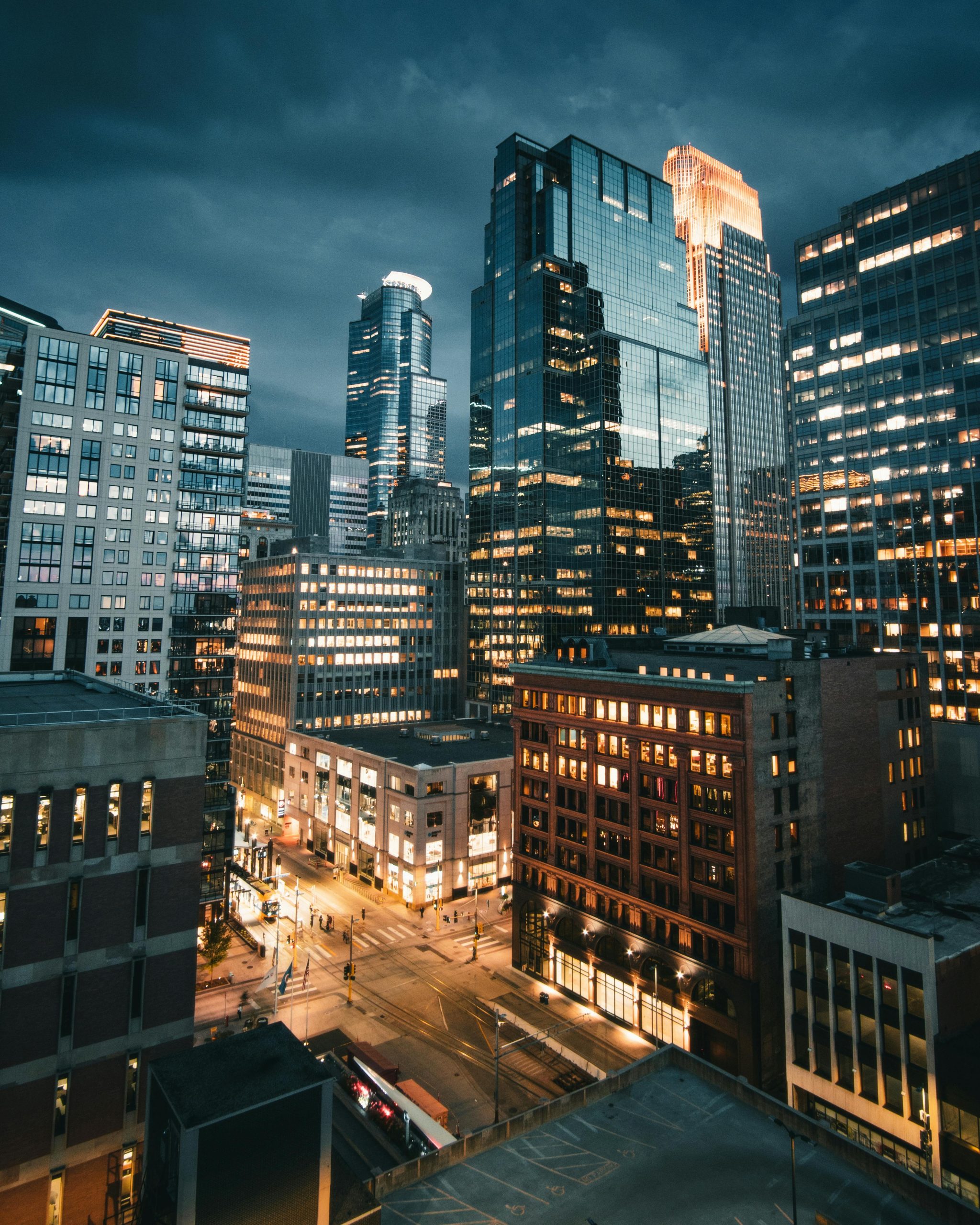 Stunning night view of downtown Minneapolis with illuminated skyscrapers.